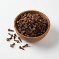 Whole cloves in a wooden bowl on white background