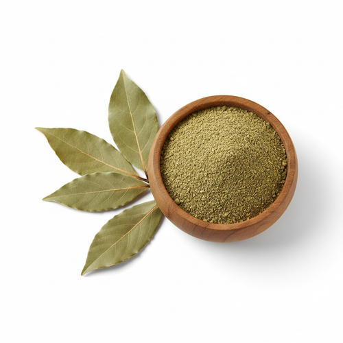 Bay leaves powder in a wooden bowl with dried bay leaves on white background